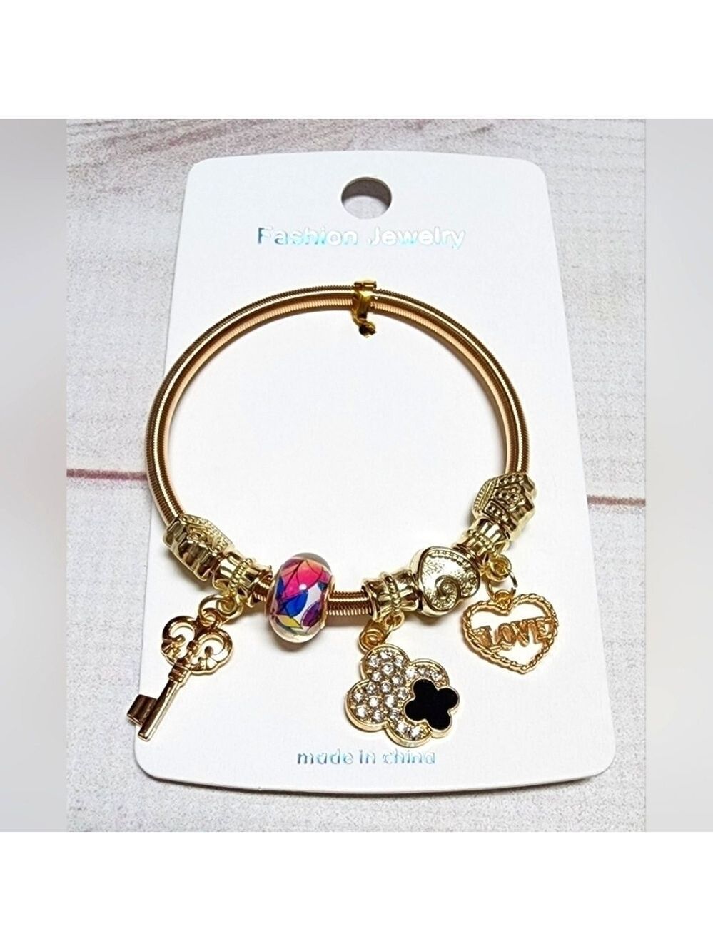 New Gold Sliding Charm Spring Bracelet